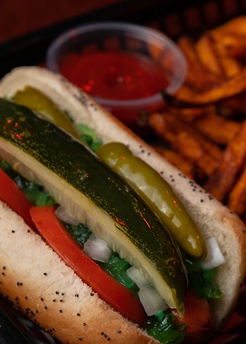 Chicago bar food staples like hot dogs, cheesesteaks, and Italian beef sandwiches